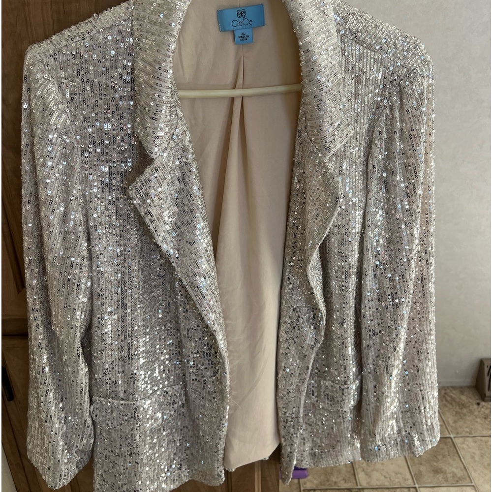 CeCe (Marshall’s brand) blazer type jacket. Size: xL silver in color